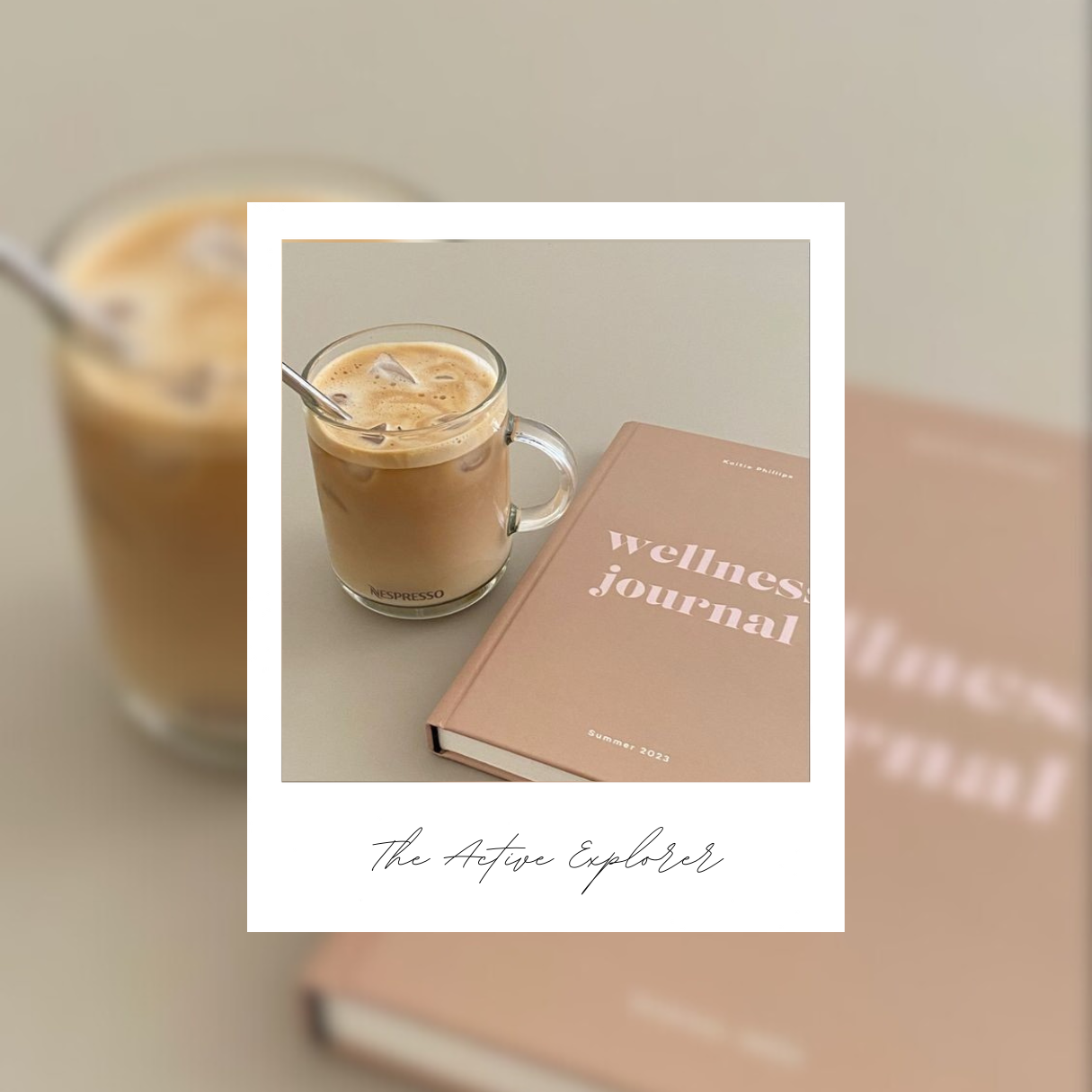 An image of a coffee in a glass nespresso mug and a pink wellness journal 