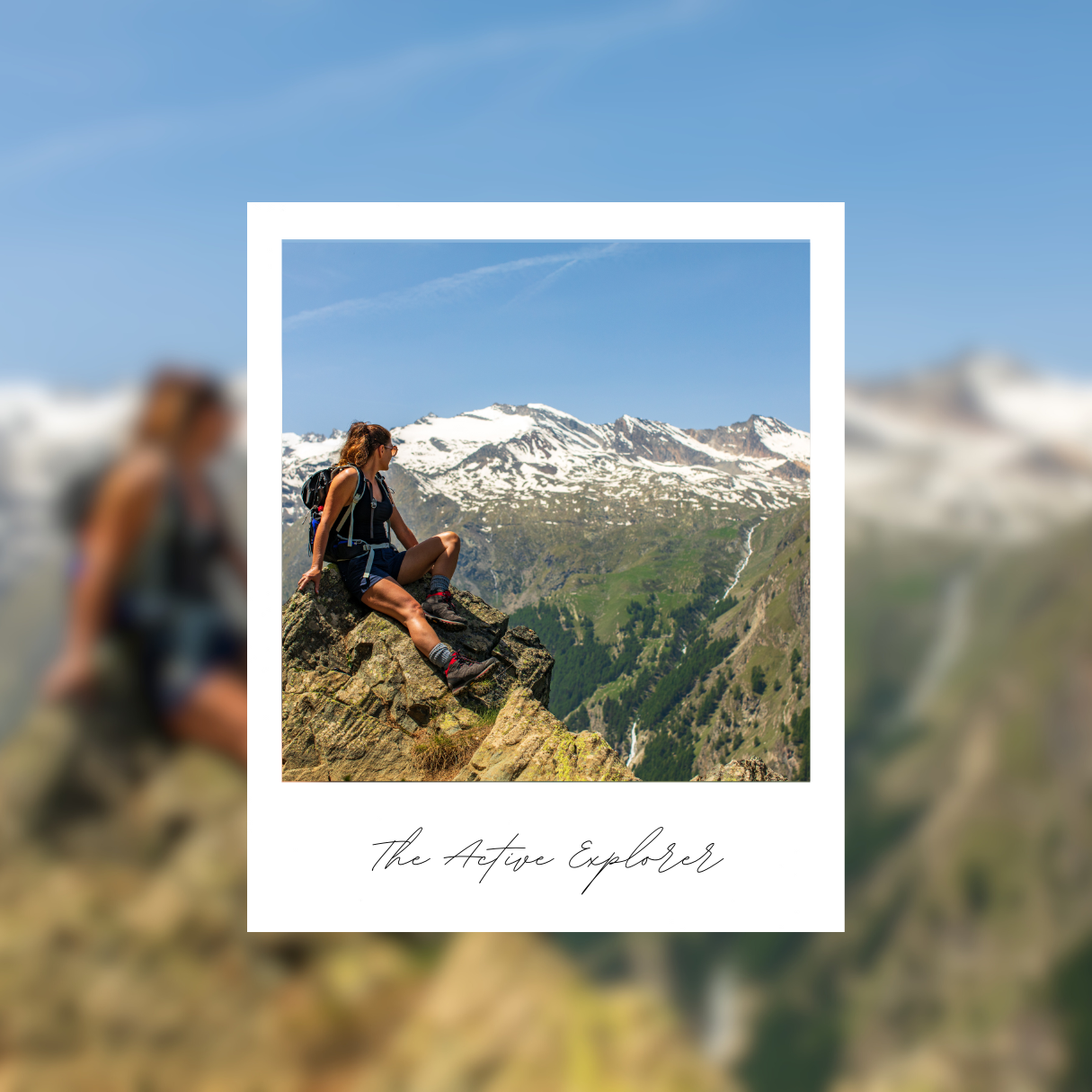 A hiker woman sitting at the peak of a mountain range, looking out over snow capped mountains