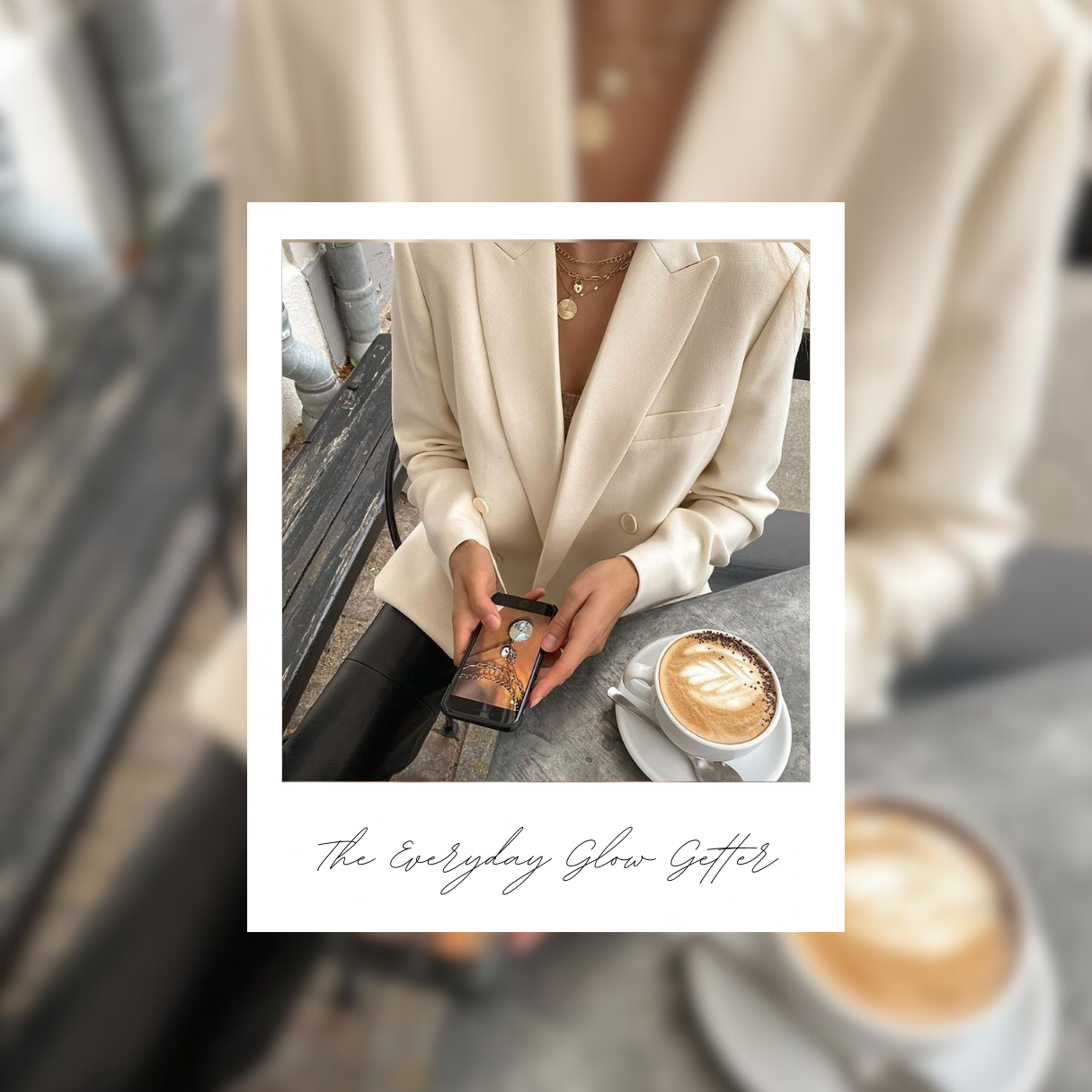 An everyday glow getter woman in a beige suit coat, at a table with a coffee looking at images on her phone