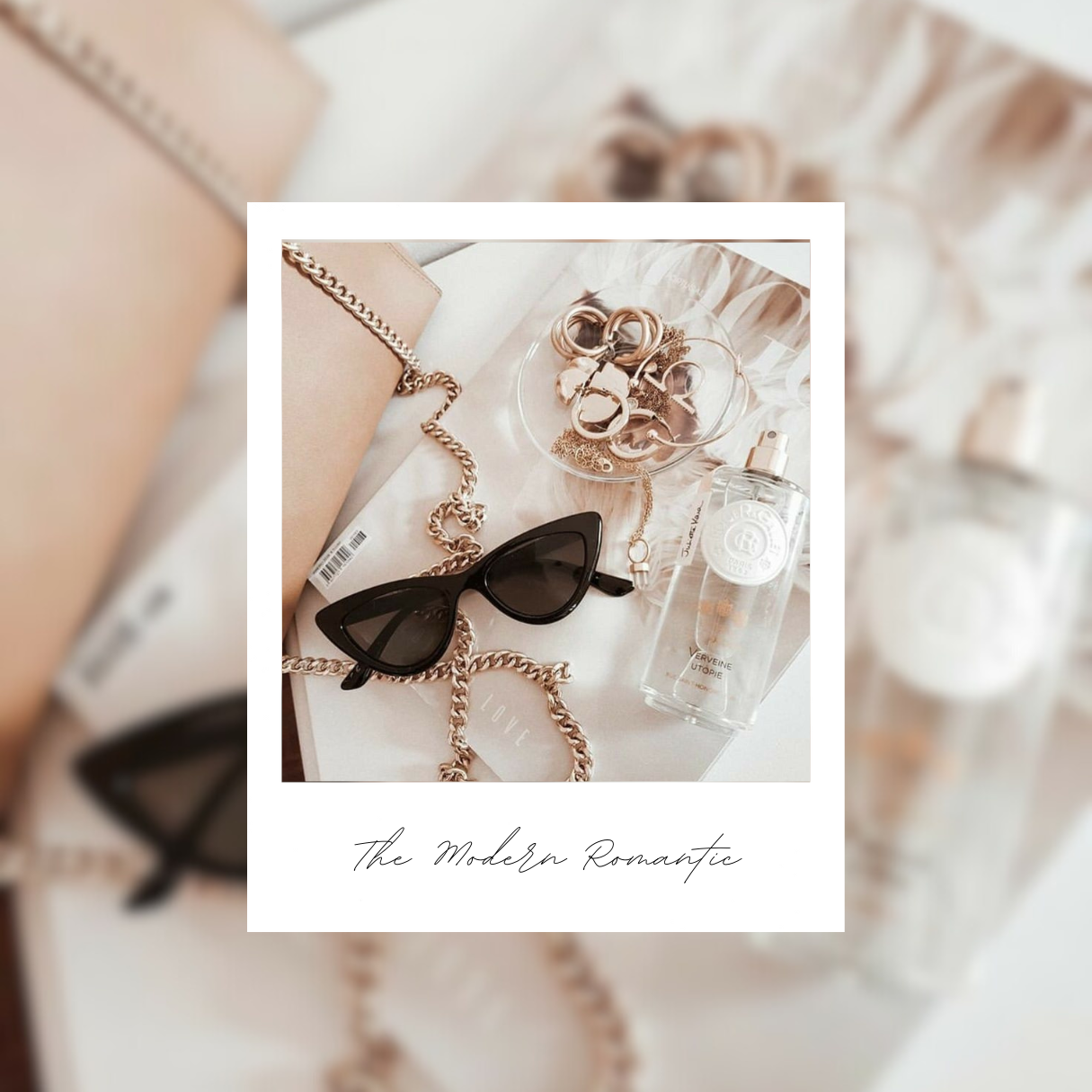 A modern romantic flatlay of a handbag, jewellery, perfume and sunglasses on a vogue magazine
